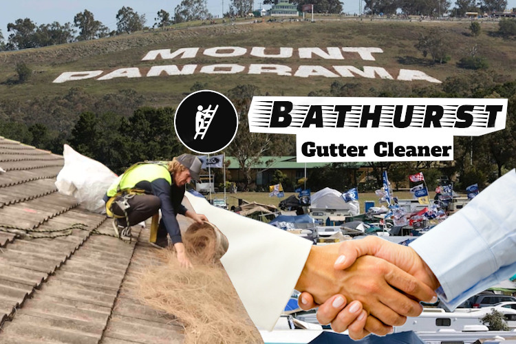 Man Cleaning Gutters in Bathurst whilst a Potential Customer is making phone calls.