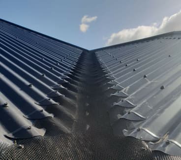 Gutter-Guard-Installation-on-a-corrugated-roof-in Canberra