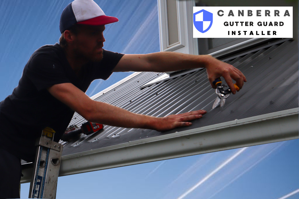 Man Installing Gutter Guard in Canberra